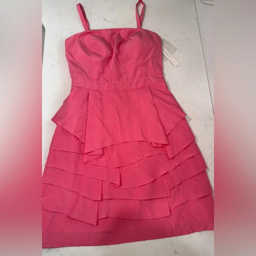 pink antonio melani dress Antonio Melani | Walking through spring in this gorgeous Amalia midi dress from Antonio Melani! Leave a comment below to receive the link in your inbox!